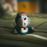 doraemon figurine in soft light with shadow